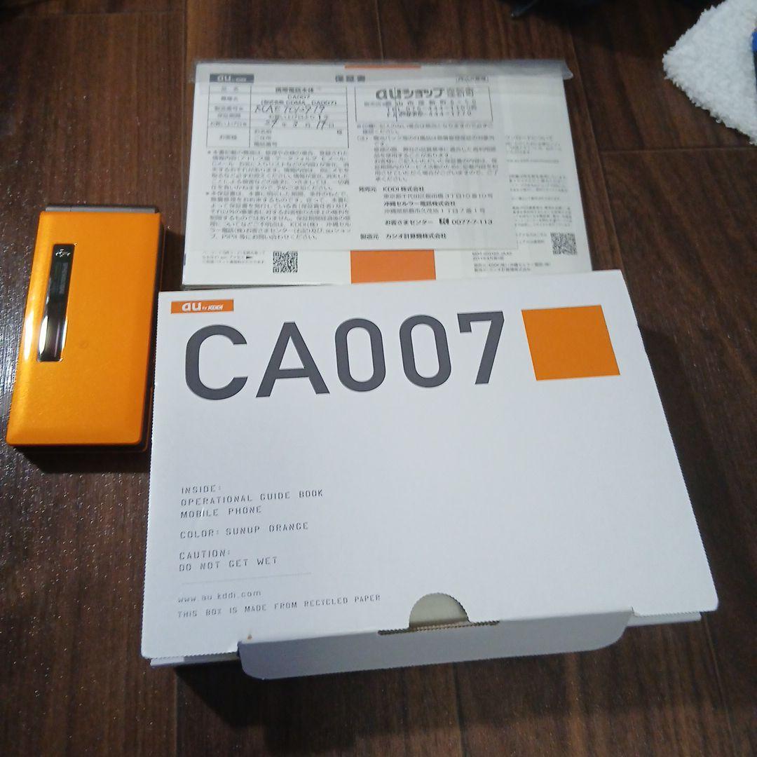 未使用オレンジ CA007 携帯電話本体