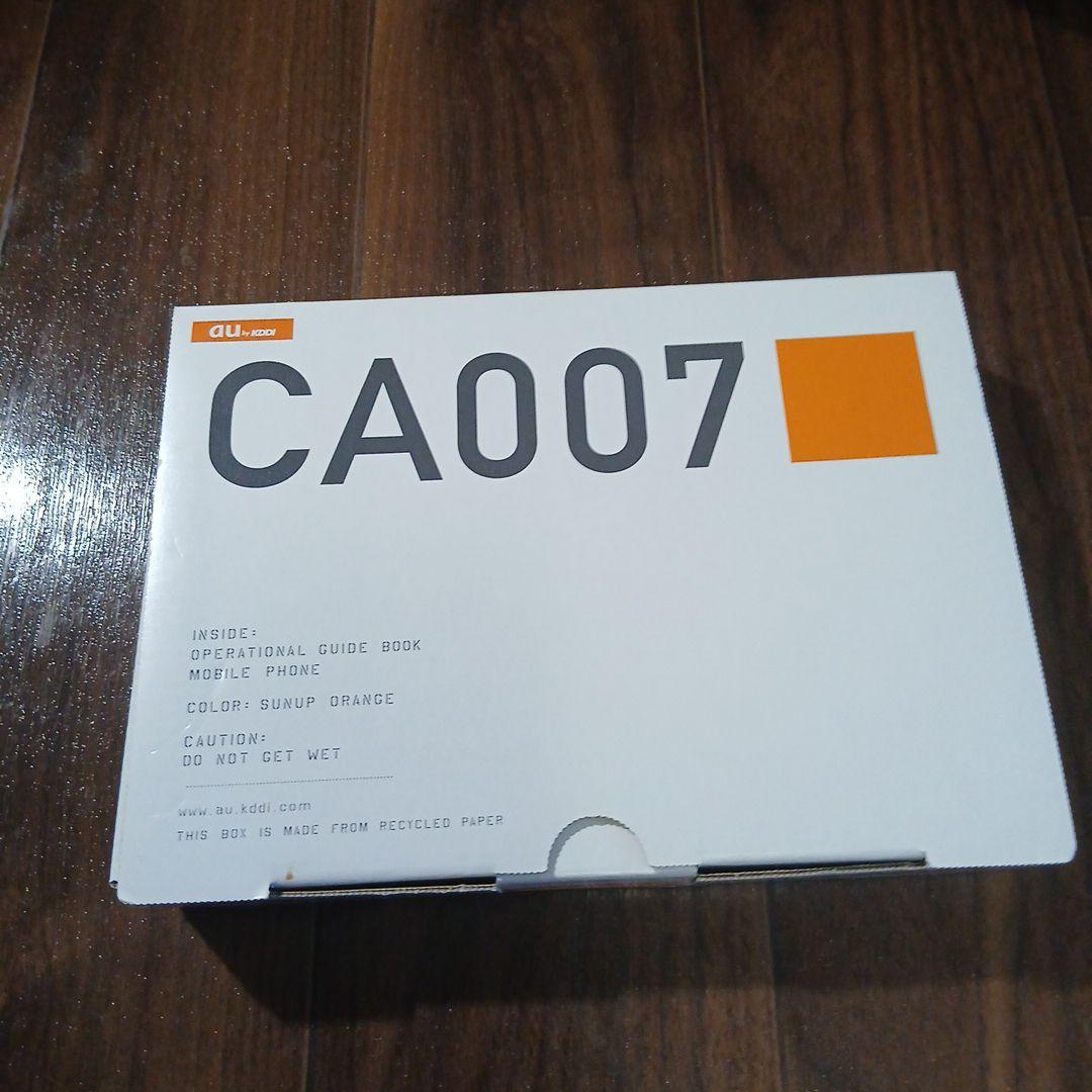 未使用オレンジ CA007 携帯電話本体
