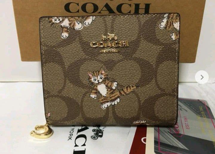 新品未使用コーチ二つ折り財布キャット猫ブラウンレディースメンズ送料無料即日発送