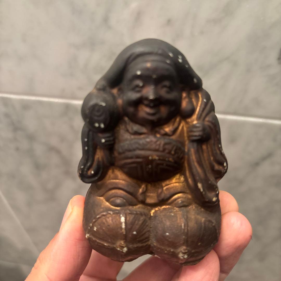 アンティーク明治時代平和的なお顔で 笑顔が素敵な大黒様の陶器オブジェ