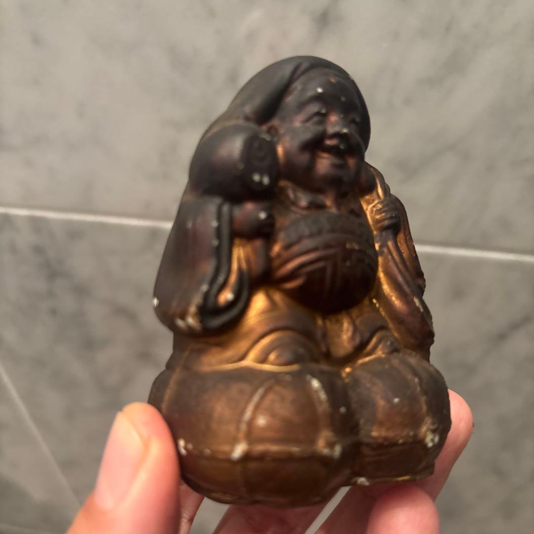 アンティーク明治時代平和的なお顔で 笑顔が素敵な大黒様の陶器オブジェ