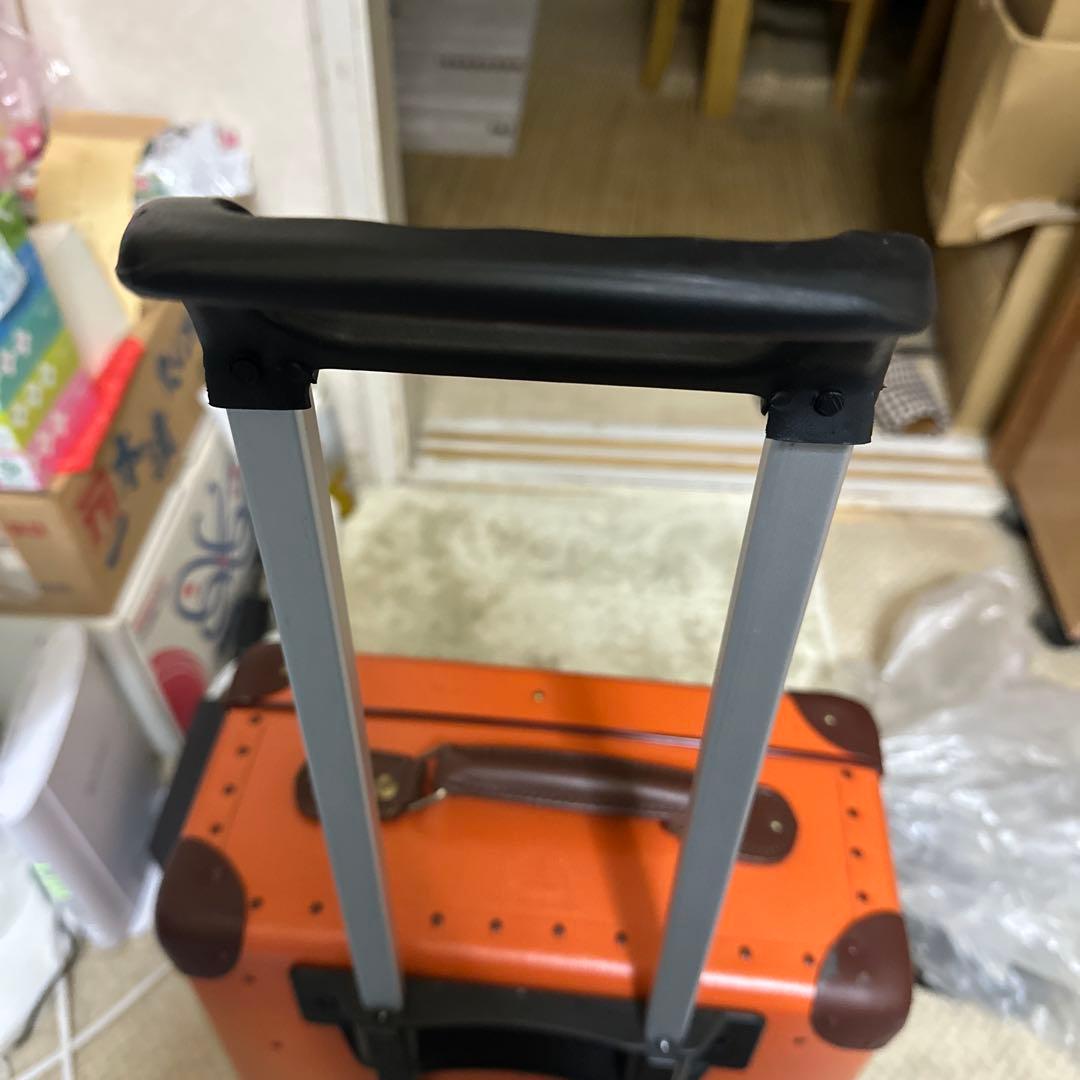 ゆうみさん専用グローブトロッターオレンジ キャリーケース