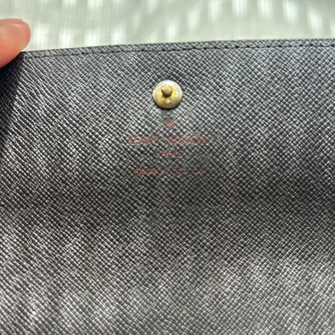 ルイ・ヴィトンのダミエ・エベヌ ポルトフォイユ・サラ長財布