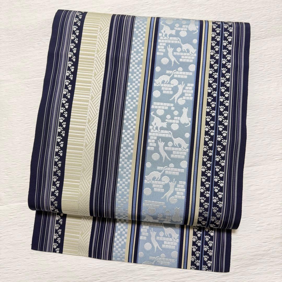 m-45 本場筑前博多織 黒木織物 猫 足跡 名古屋帯 正絹 未使用極美品