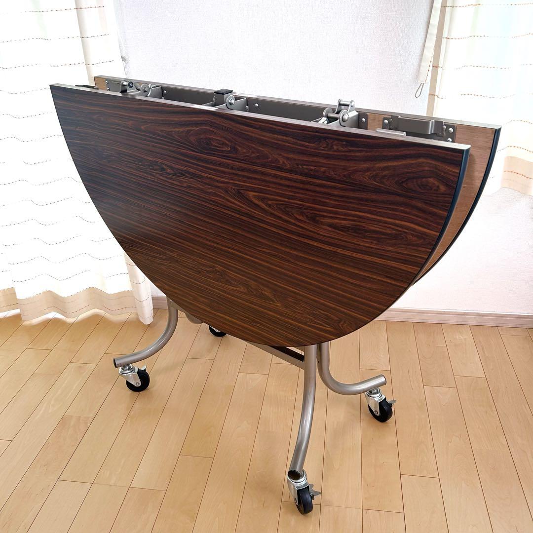 フライト式円型テーブル　折りたたみテーブル　直径120cm 丸テーブルキャスター