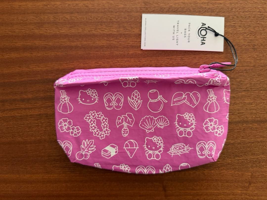 レア！アロハコレクション 日焼けキティ ハワイDFS限定 ポーチ ピンク