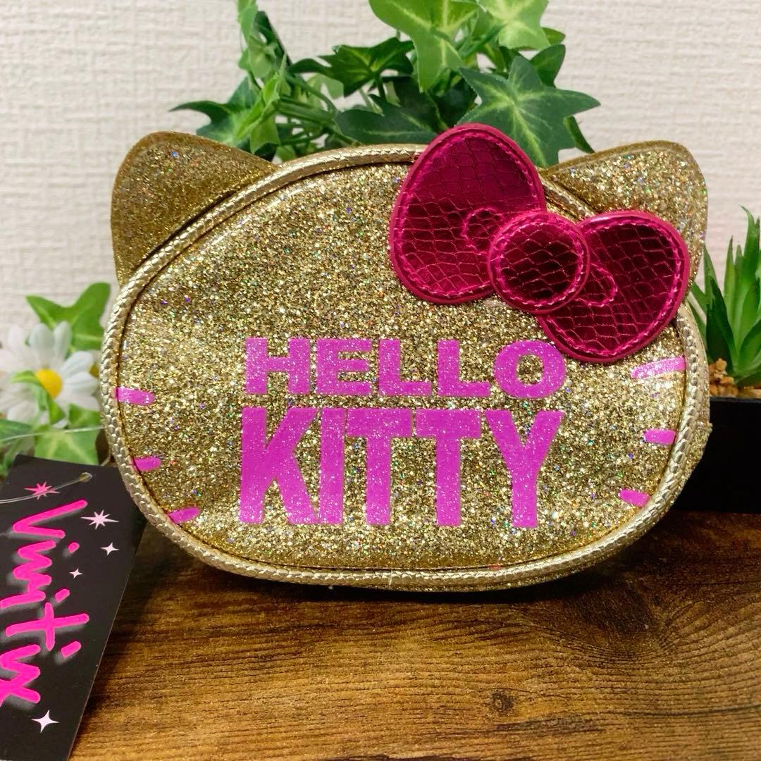 【新品未使用】ハローキティ　キラキラ　ゴールドポーチ☆Vivitix☆ タグ付き