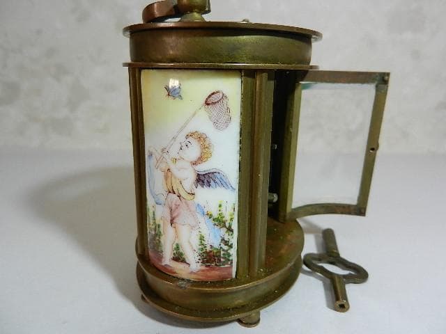 アンティーク楕円形ネジ巻きキャリッジクロック(エリオット&サン　 ロンドン)