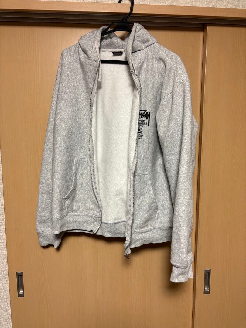 Stüssy グレー パーカー Lサイズ バックプリント