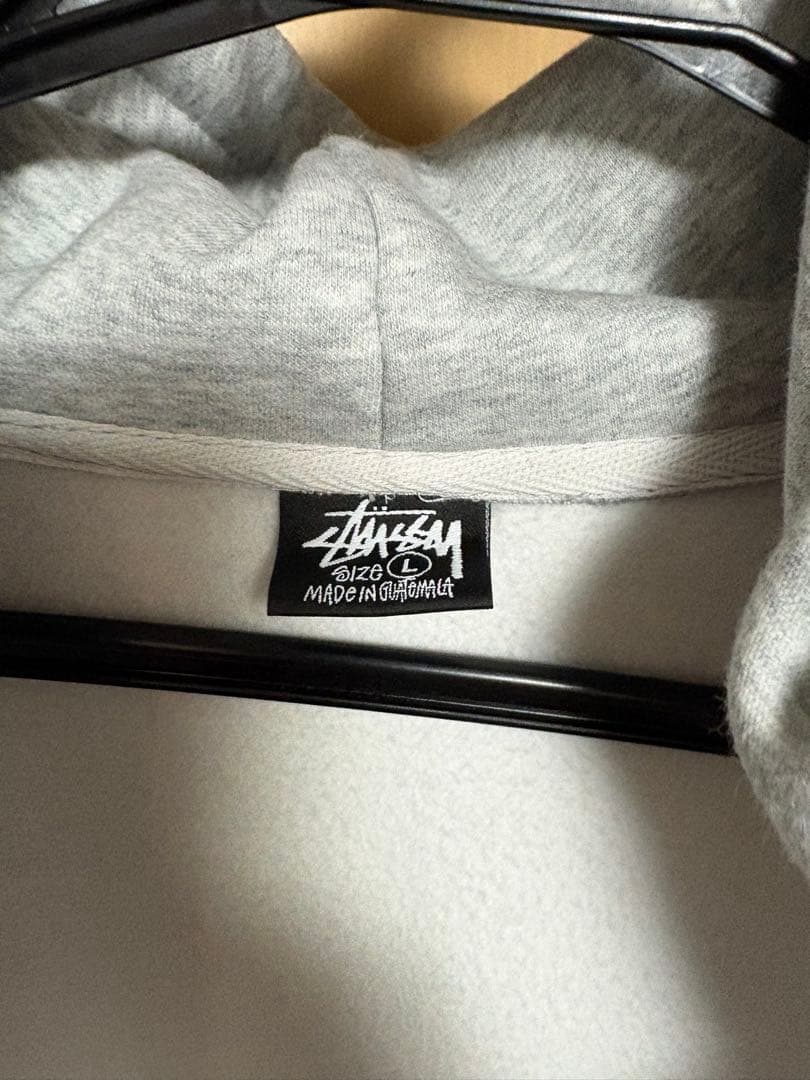 Stüssy グレー パーカー Lサイズ バックプリント