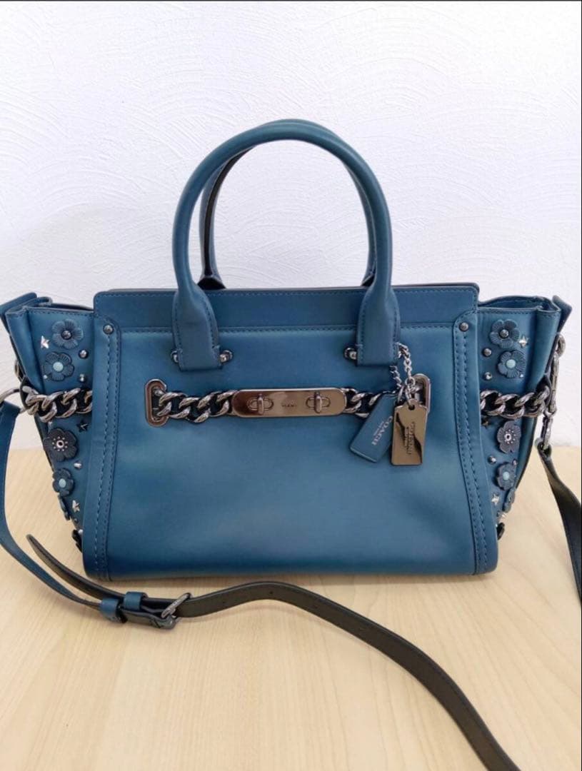 コーチのグローブレザー スワッガー 27 ハンドバッグ（ダークターコイズ）