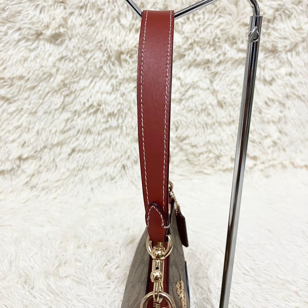 【美品】COACH＊ハンド 2way アクセサリーポーチ PEANUTSコラボ