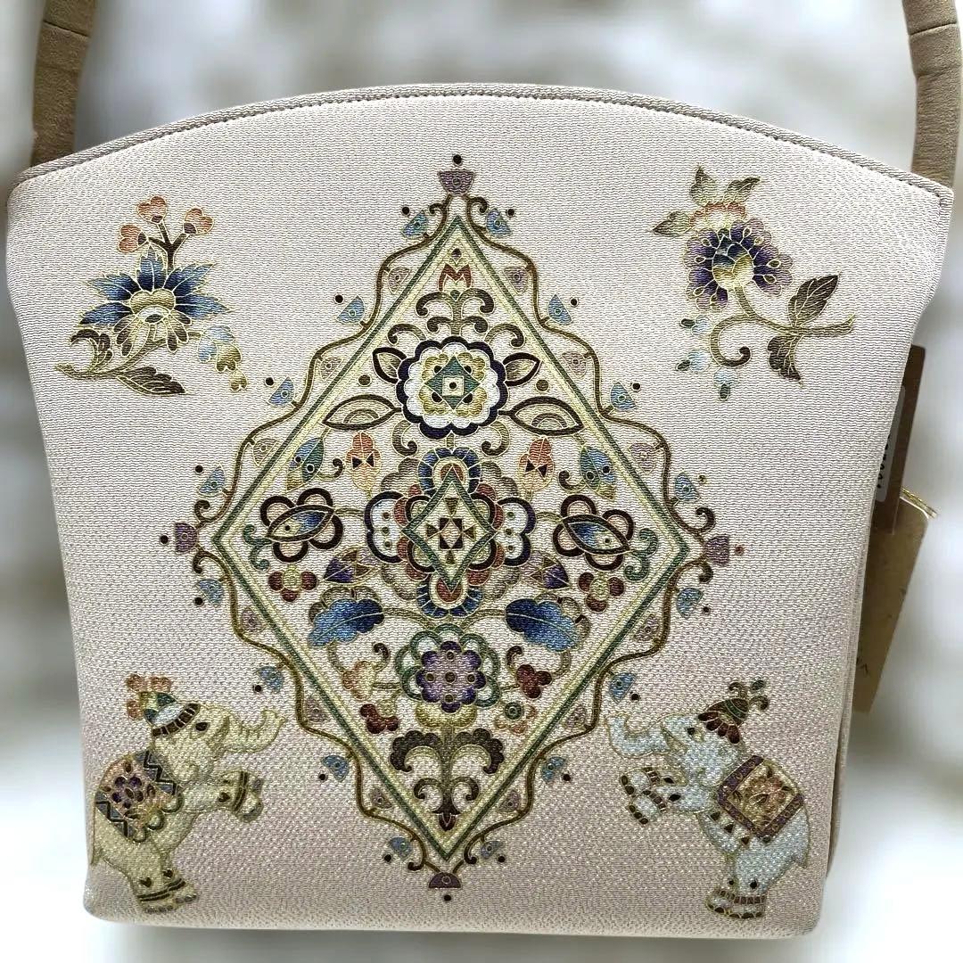 【未使用品】岡重　オカジマ　皇室御用達　和装バッグ　絹100% 象 花柄