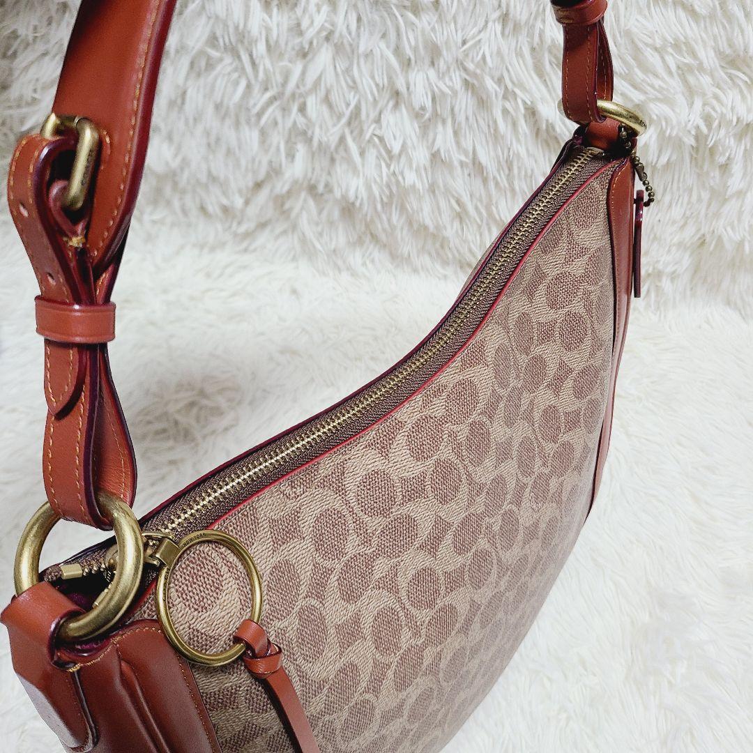 コーチ　ハンドバッグ　サットン　ホーボー　シグネチャー　PVC　レザー