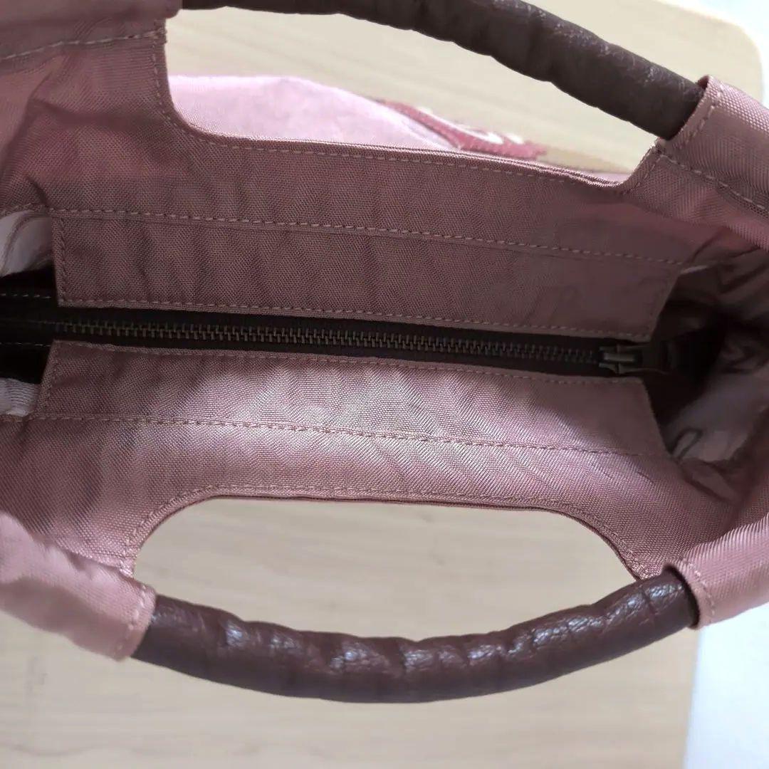 IBIZAイビザ　ナイロン×レザー手提げバッグ　薔薇モチーフ