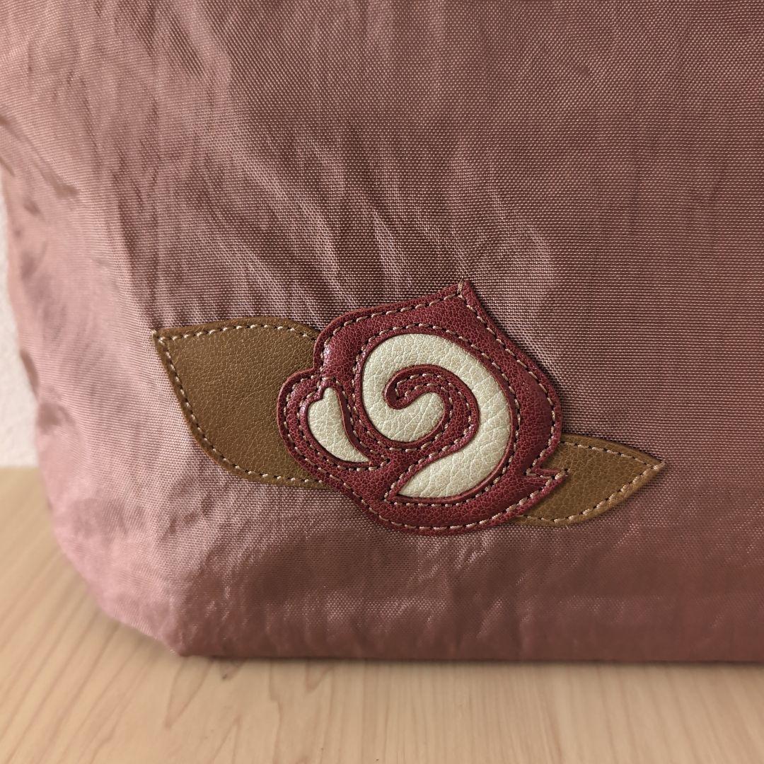 IBIZAイビザ　ナイロン×レザー手提げバッグ　薔薇モチーフ