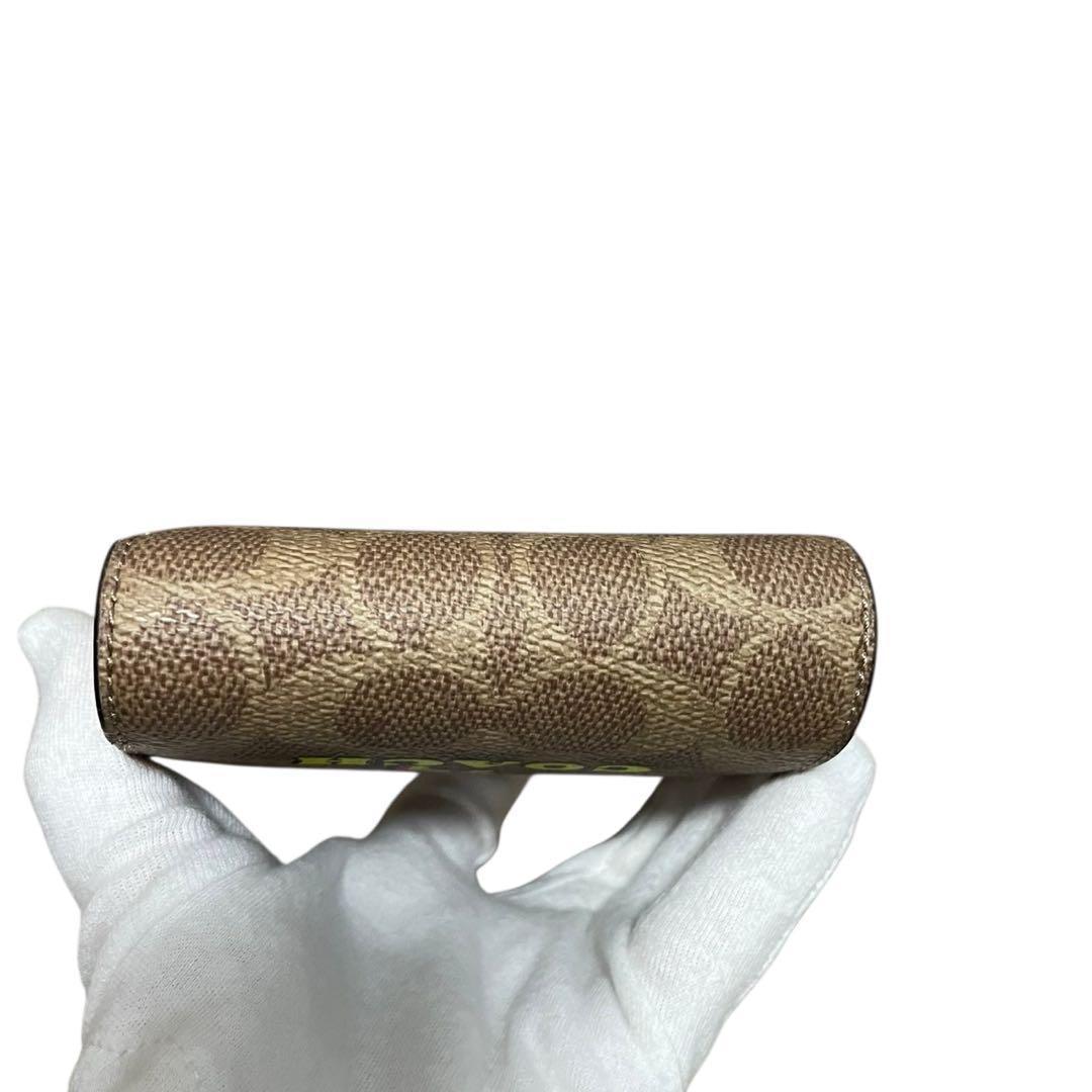 【新品】コーチ スナップウォレット コズミック シグネチャー レキシー