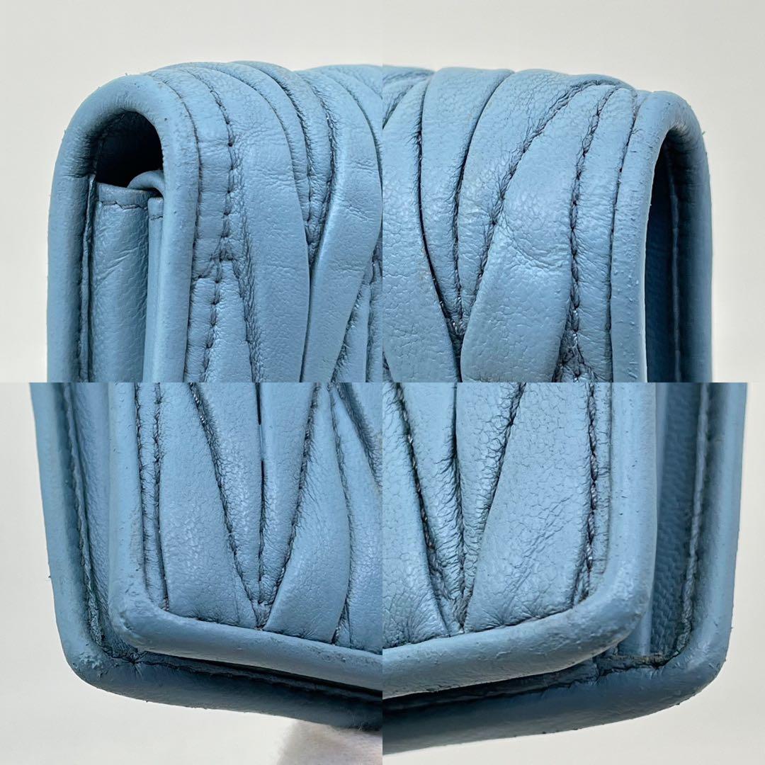 ミュウミュウ 二つ折り財布 マテラッセ クリスタル ビジュー ロゴ金具 レザー