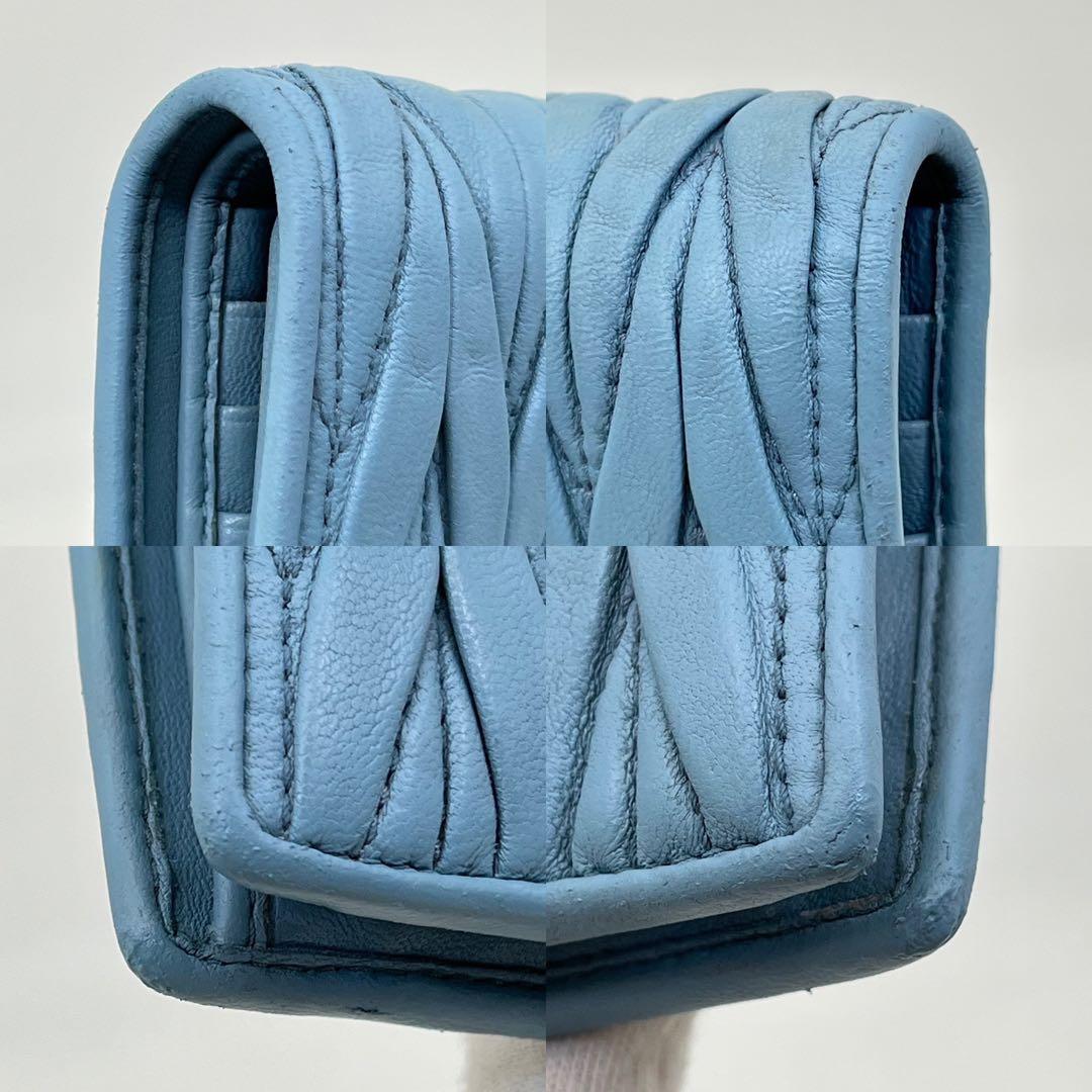 ミュウミュウ 二つ折り財布 マテラッセ クリスタル ビジュー ロゴ金具 レザー