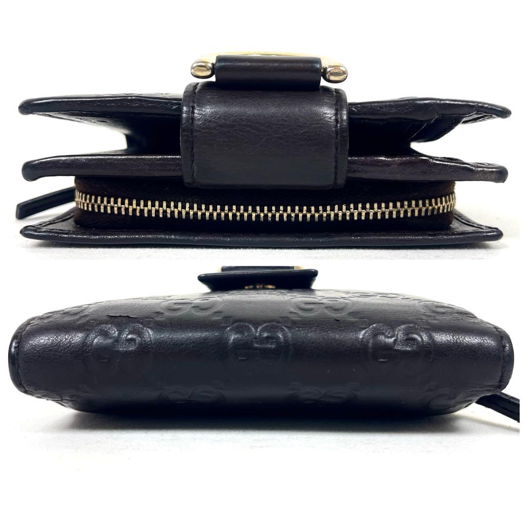 グッチ　二つ折り財布　アビー　シマレザー　ラウンドファスナー　ロゴ　エンボス