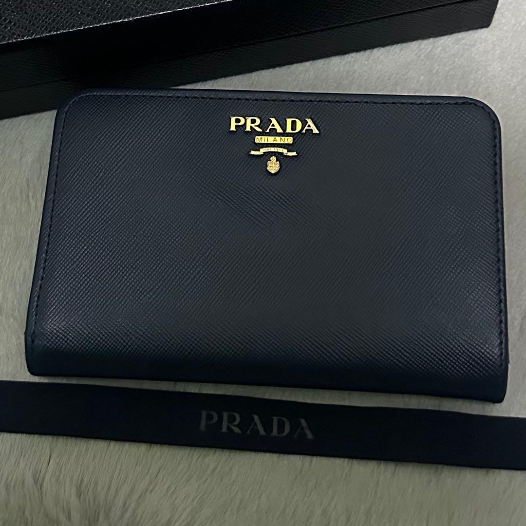 PRADA プラダ　折り財布　ラウンドファスナー　ブルー　ゴールドロゴ