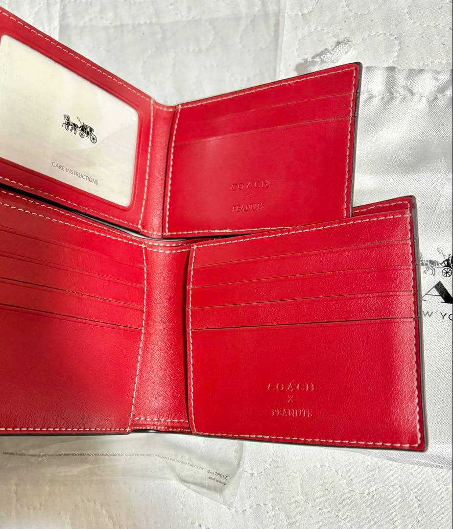 コーチ折りたたみ財布　カードケーススヌーピー新商品