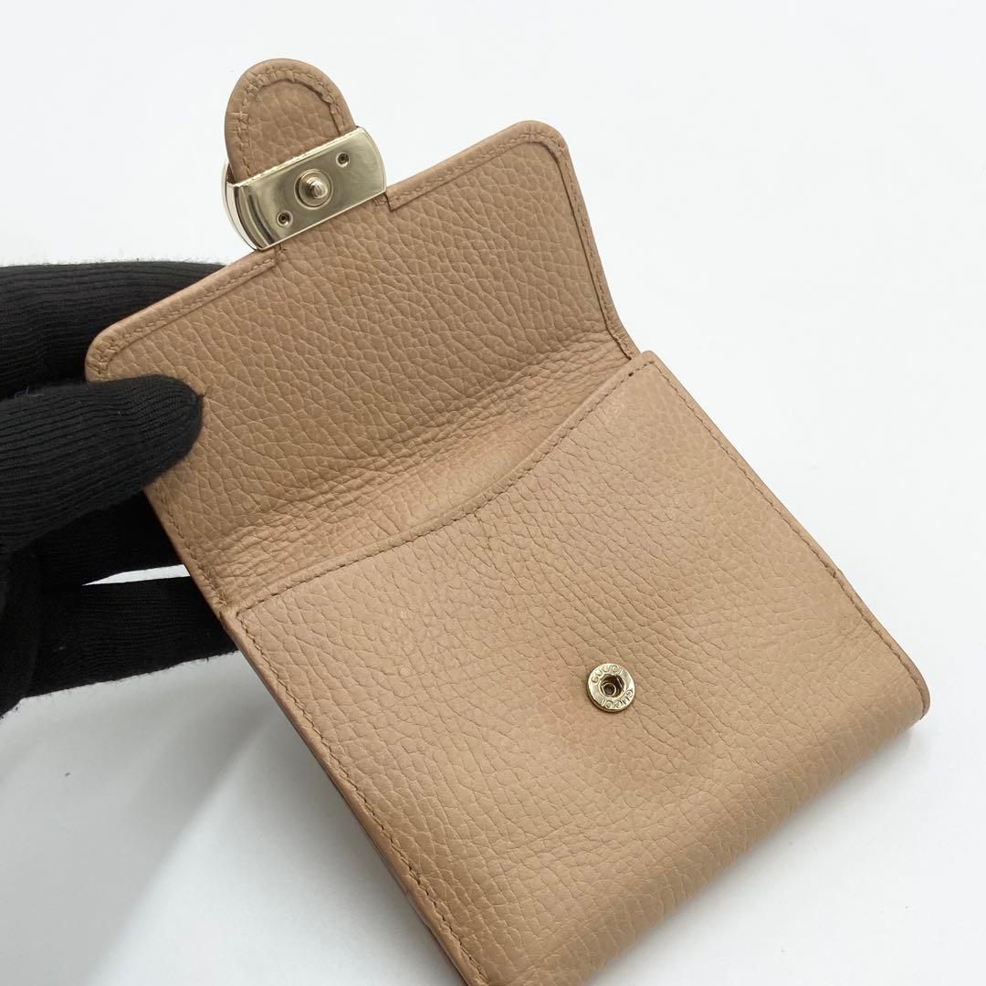 GUCCI インターロッキングG ダラーカーフ 二つ折り財布 ゴールド　ベージュ