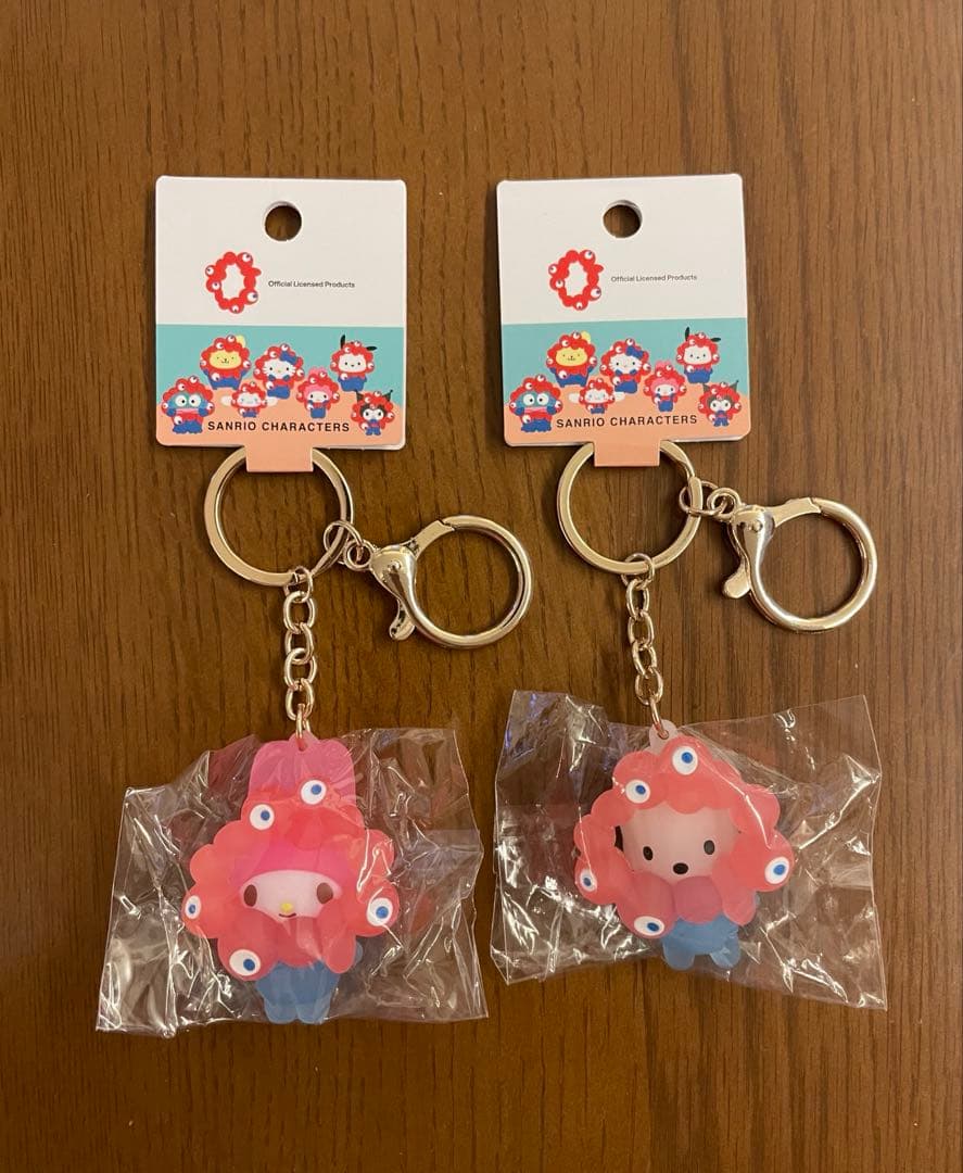 【未開封品】万博 ミャクミャク サンリオ なりきり キーホルダー クリアカラー