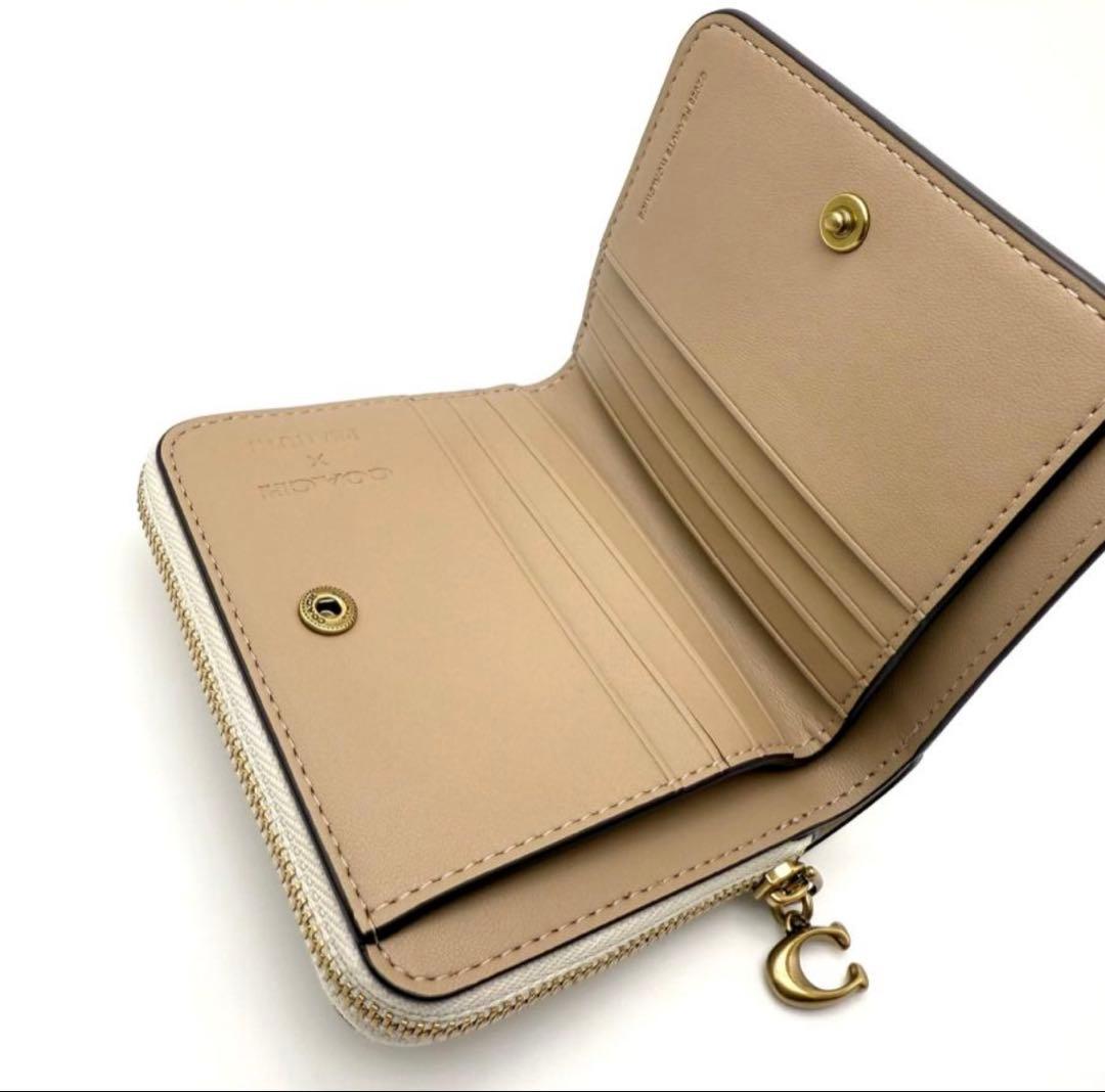 【新品未使用】coachスヌーピー 二つ折り財布コーチスヌーピーSNOOPY