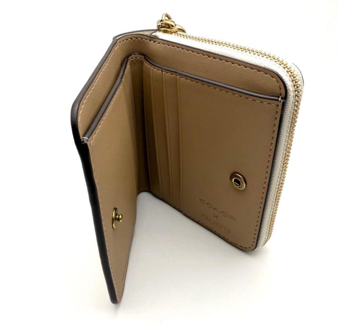 【新品未使用】coachスヌーピー 二つ折り財布コーチスヌーピーSNOOPY