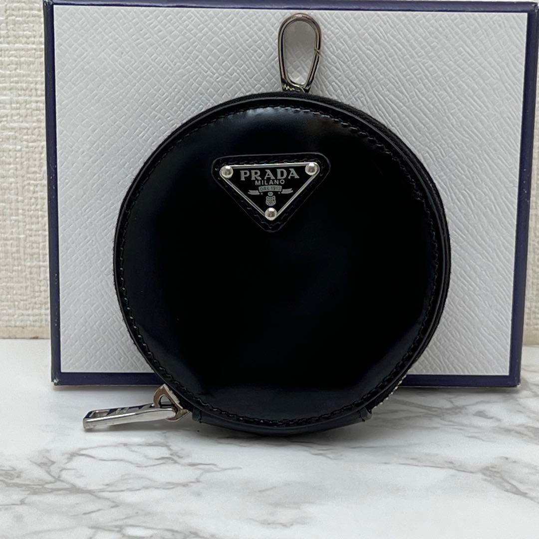 プラダ ブラッシュドレザー ラウンド ミニポーチ ケース ブラック