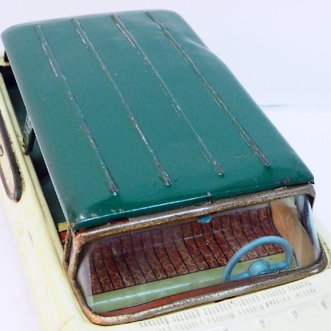 萬代屋  マーキュリー ワゴン白アイボリー右後輪欠tinブリキtoy car箱無