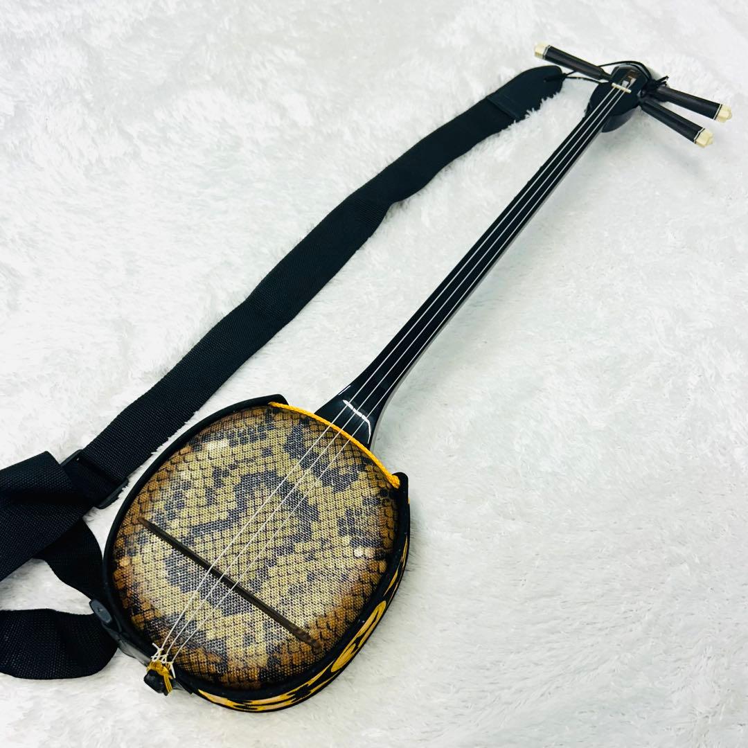【美品】沖縄三線　蛇柄　人工皮仕様　三味線タイプ　リュックケース付き