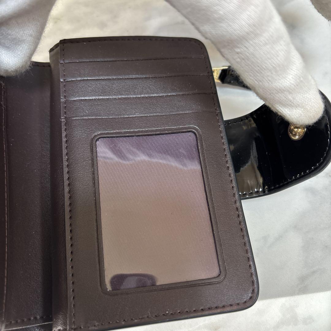 【美品】COACH コーチ 折り財布シグネチャーエンボス加工パテントレザー　黒