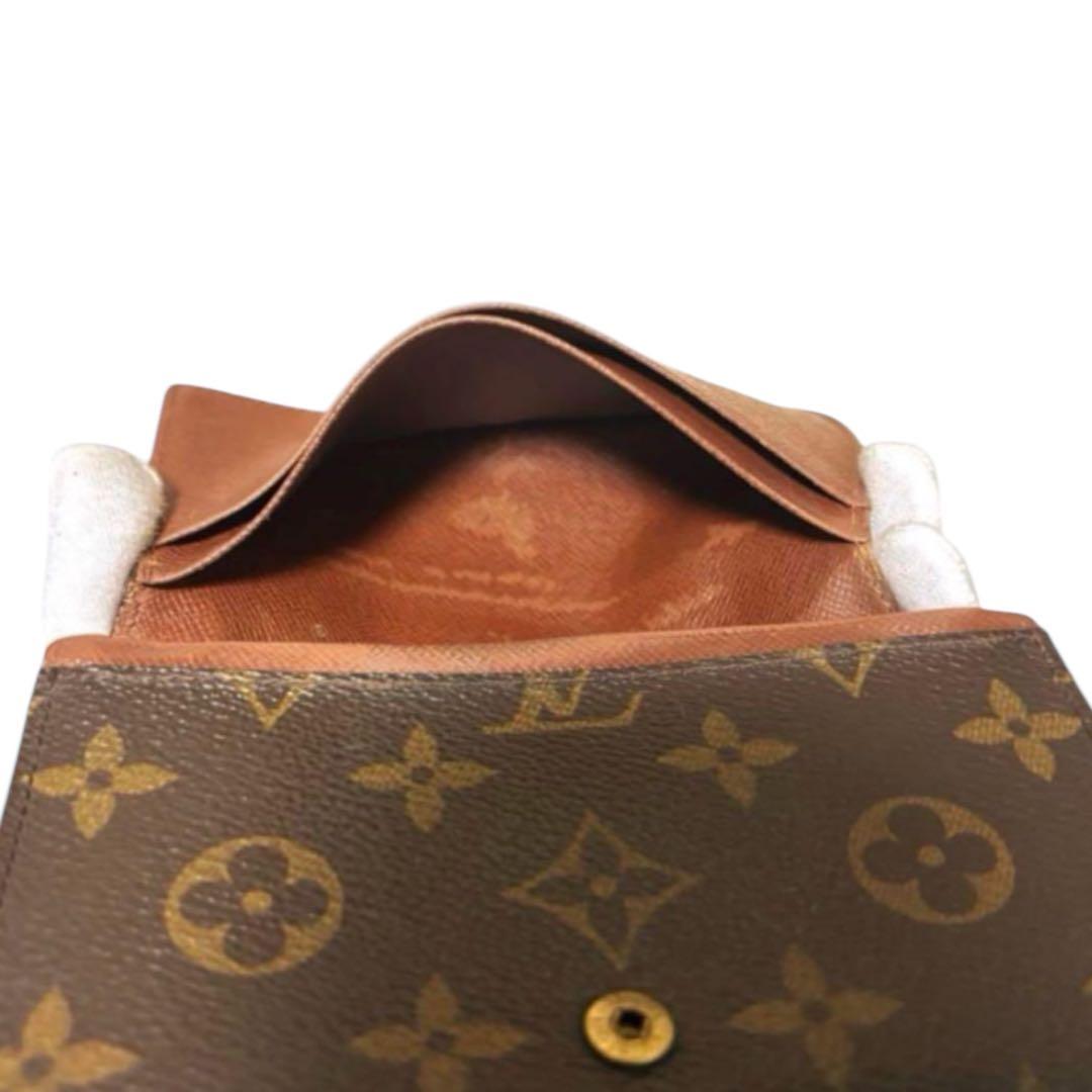 ルイヴィトン　折り財布　ポルトモネビエトレゾール　モノグラム　ブラウン　PVC