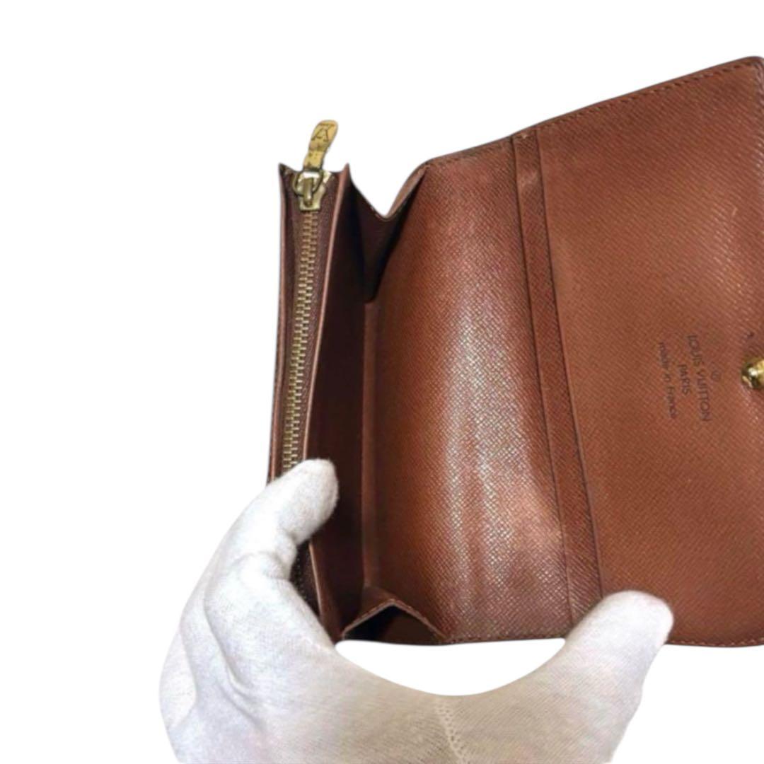 ルイヴィトン　折り財布　ポルトモネビエトレゾール　モノグラム　ブラウン　PVC