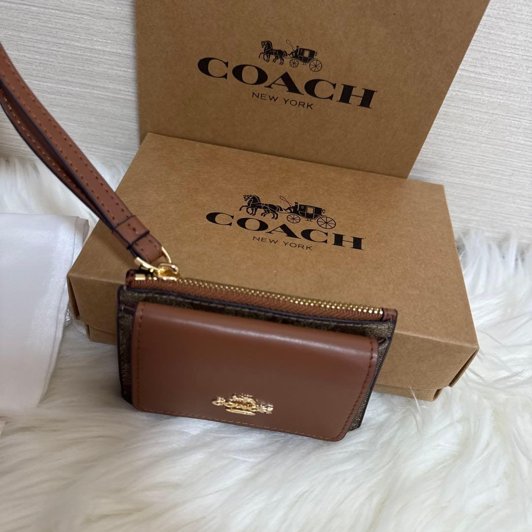 COACH ブラウンレザー ケース