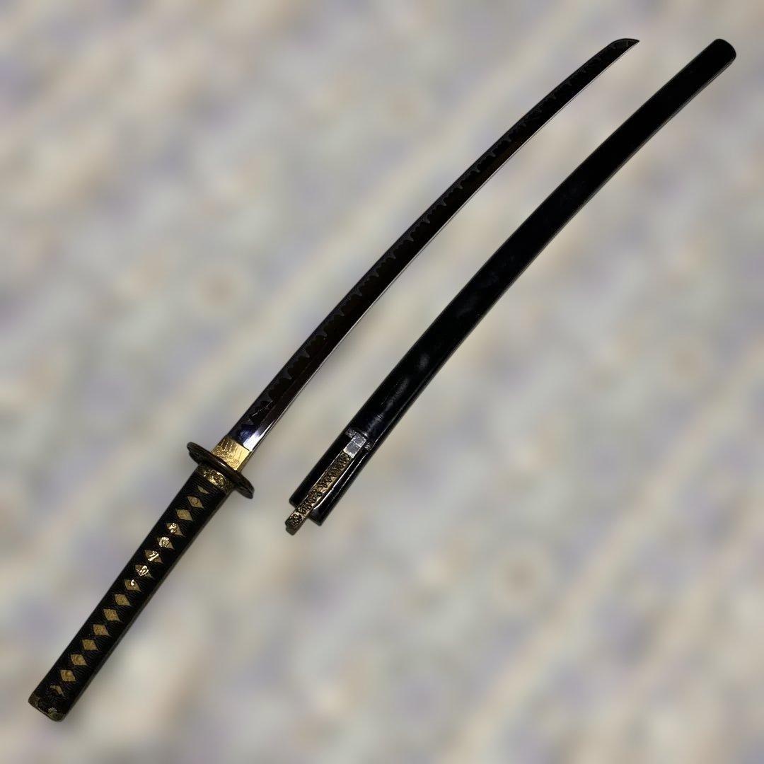 模造刀(小柄付) 黒柄 龍彫楕円鍔 黒呂鞘