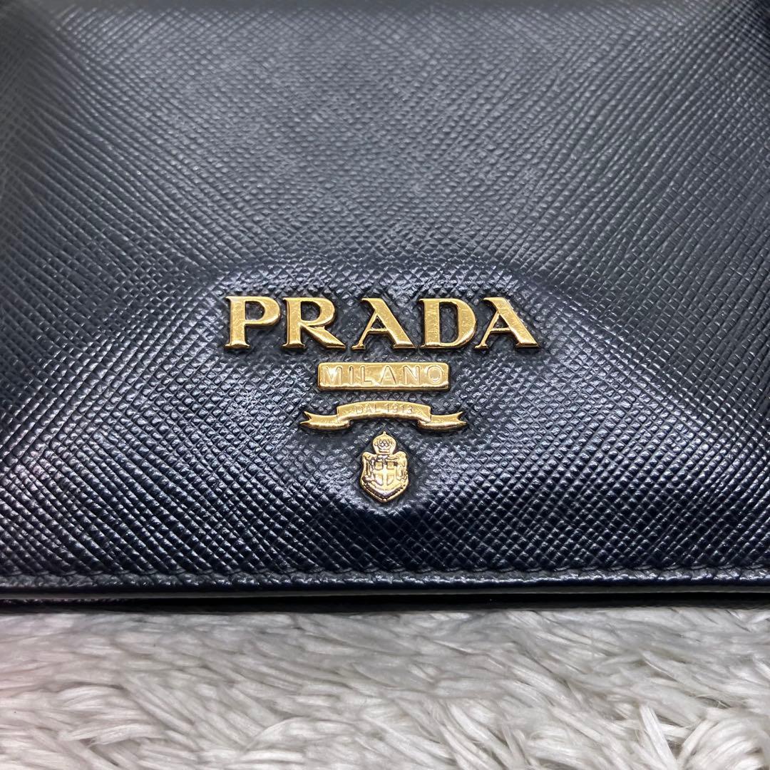 現行美品✨PRADA サフィアーノ メタルロゴ 二つ折り財布 フラップ ブラック