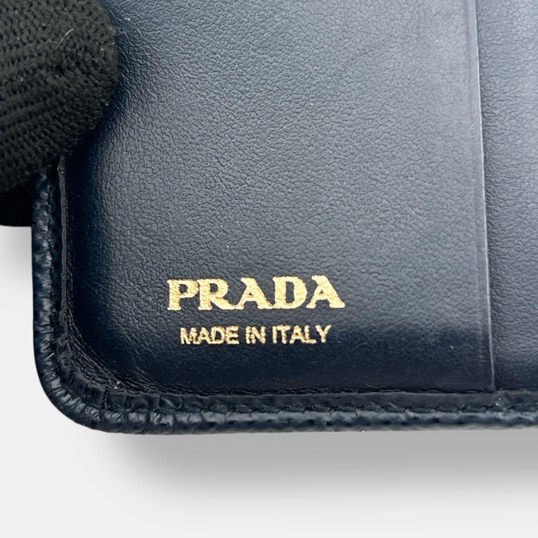 美品 プラダ 二つ折り財布 コンパクト サフィアーノレザー ロゴ 1ML018