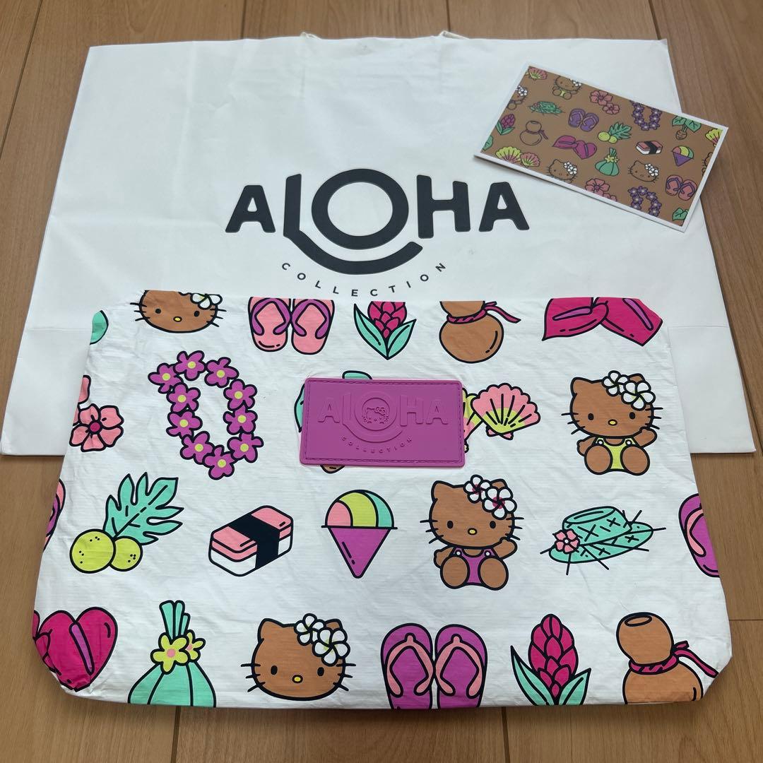 新品　Aloha Collection ハローキティ クラッチバッグ