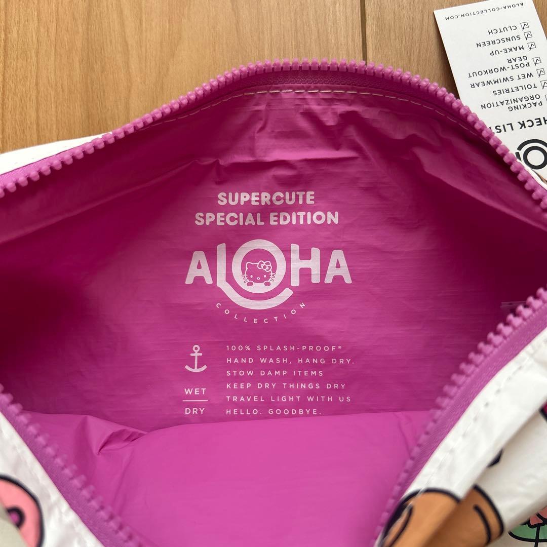新品　Aloha Collection ハローキティ クラッチバッグ