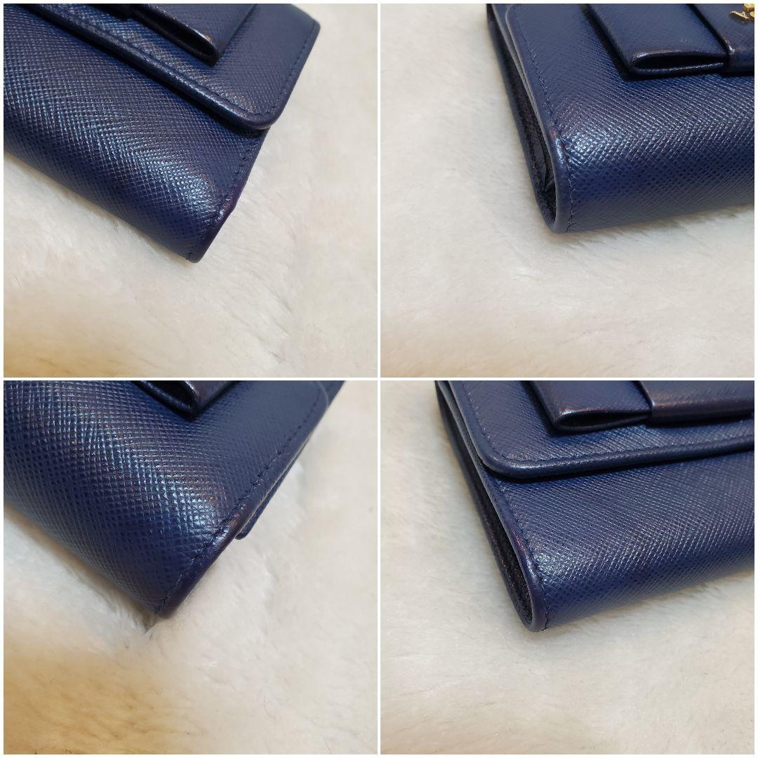 美品　PRADA 折り財布 サフィアーノ メタルロゴ リボン ブルー