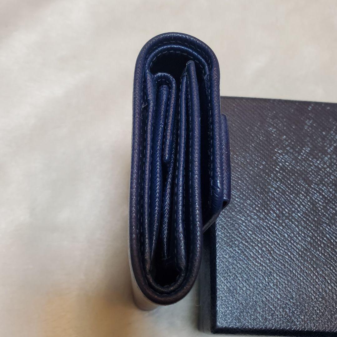 美品　PRADA 折り財布 サフィアーノ メタルロゴ リボン ブルー
