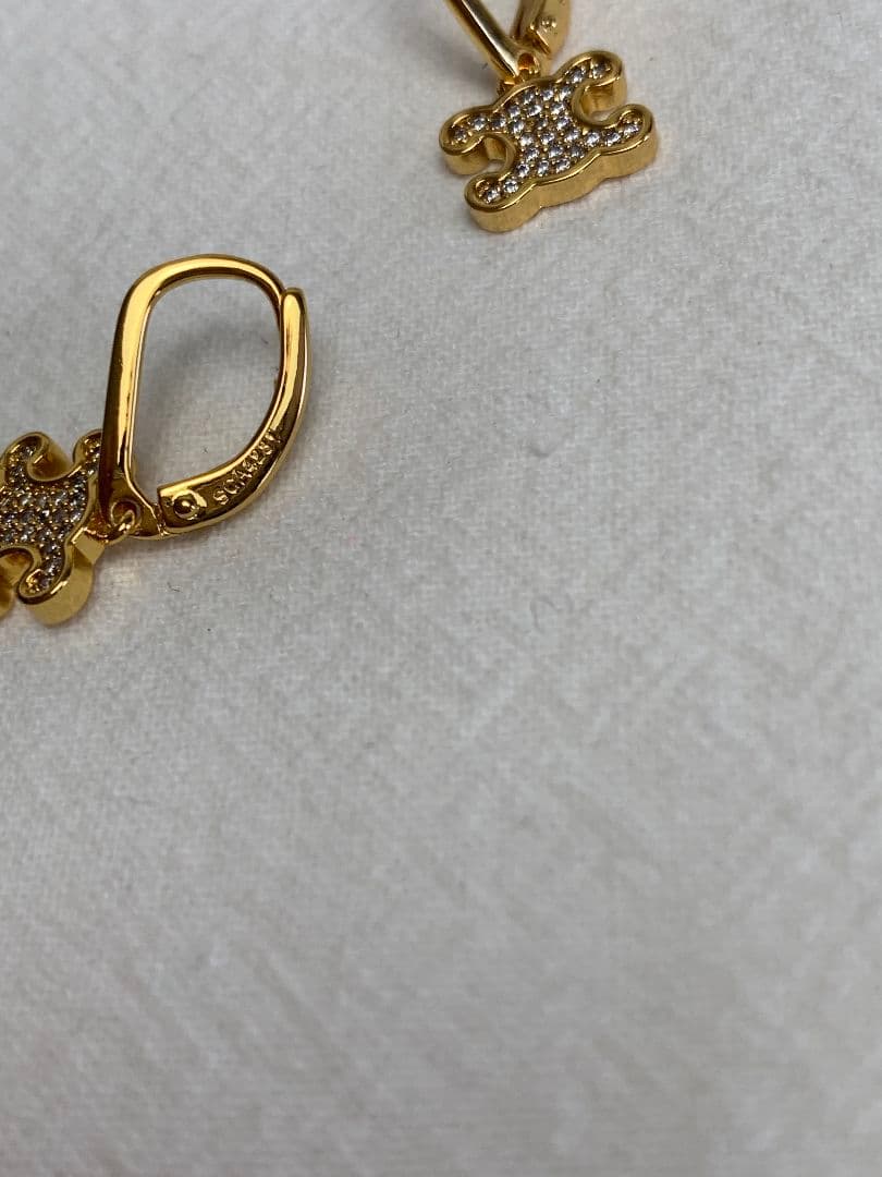 ゴールド トリオンフ ラインストーン ピアス