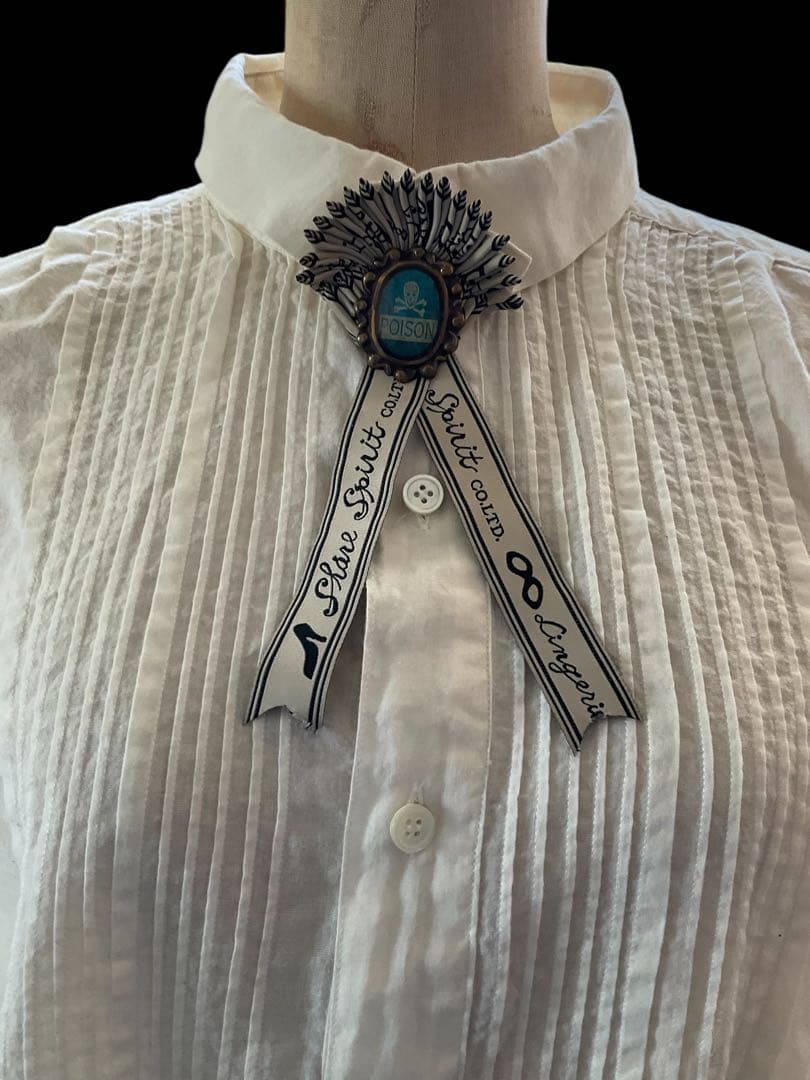 シェアスピリット　タイブローチ