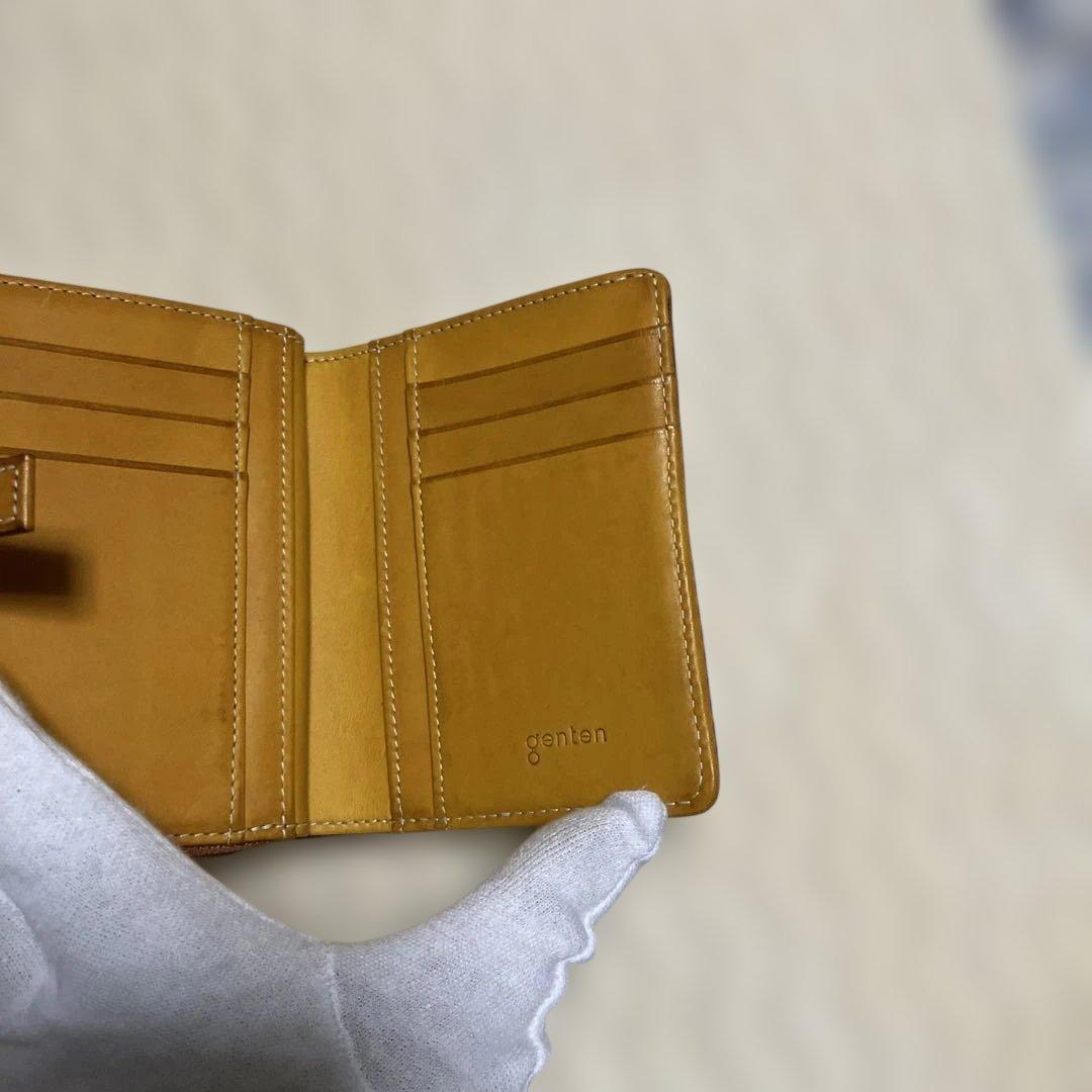 (美品) genten ゲンテン　カットワークレザー　二つ折り財布　オシャレ