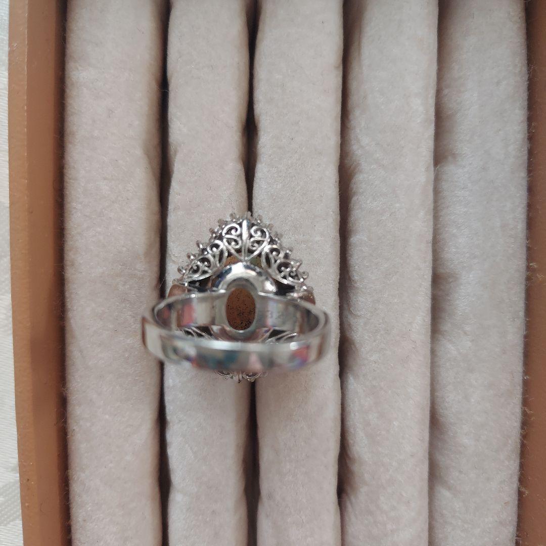 オパール3.25ct 重量12.5g ダイヤ取巻き大粒オパール指輪