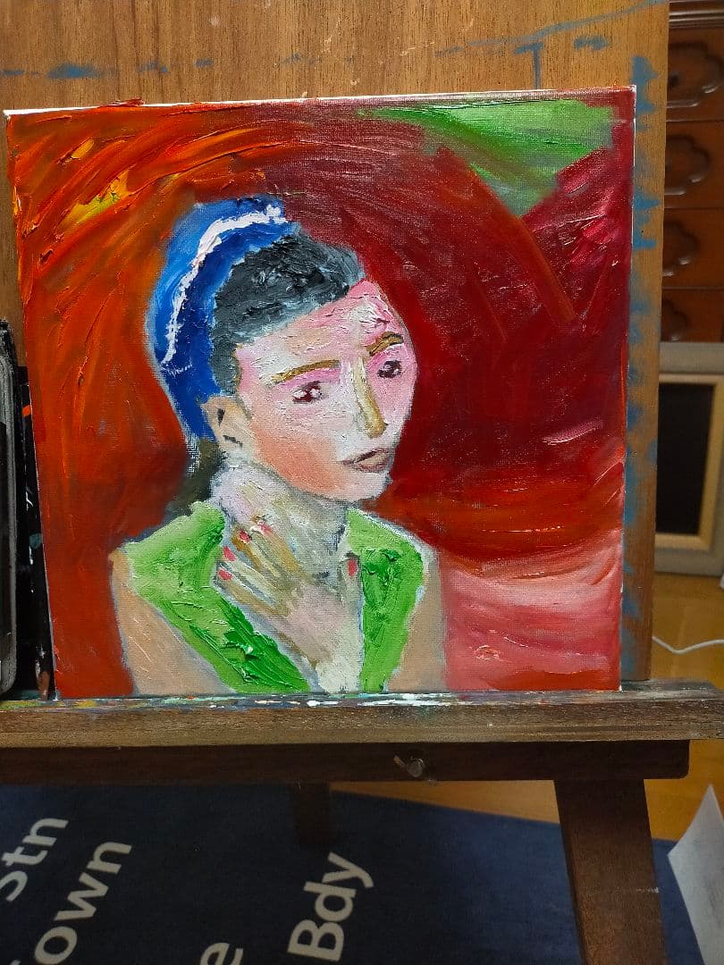 青いバンダナの女