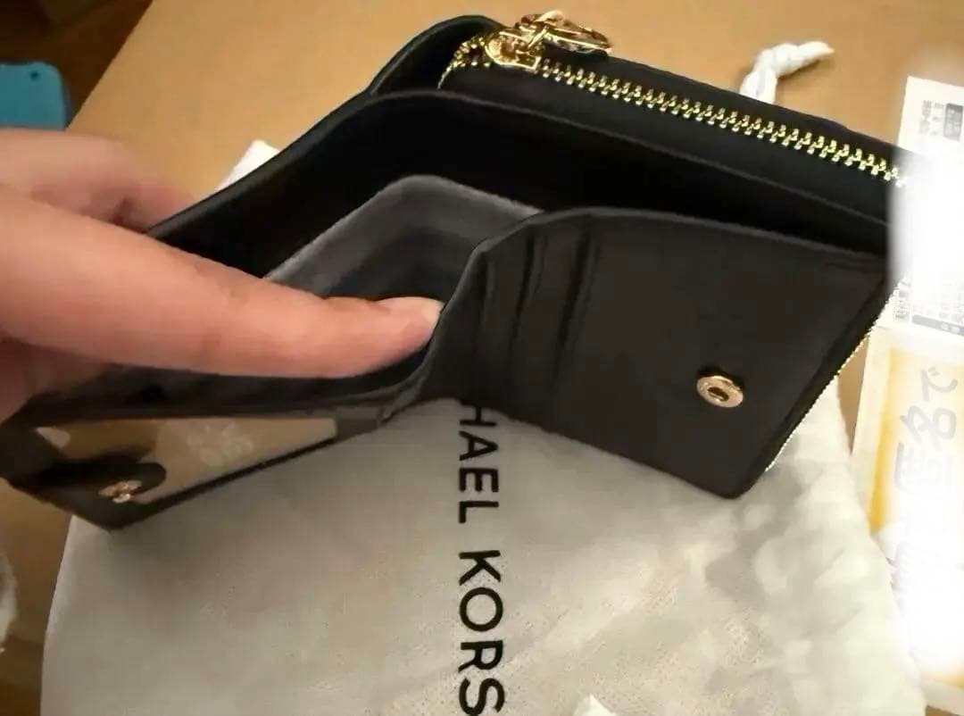 バイキンマン。MICHAEL KORS 二つ折り財布 ブラック